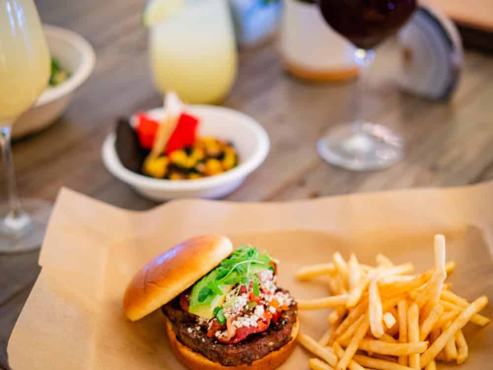 A burger and fries served as part of the food services at Under Canvas Grand Canyon.