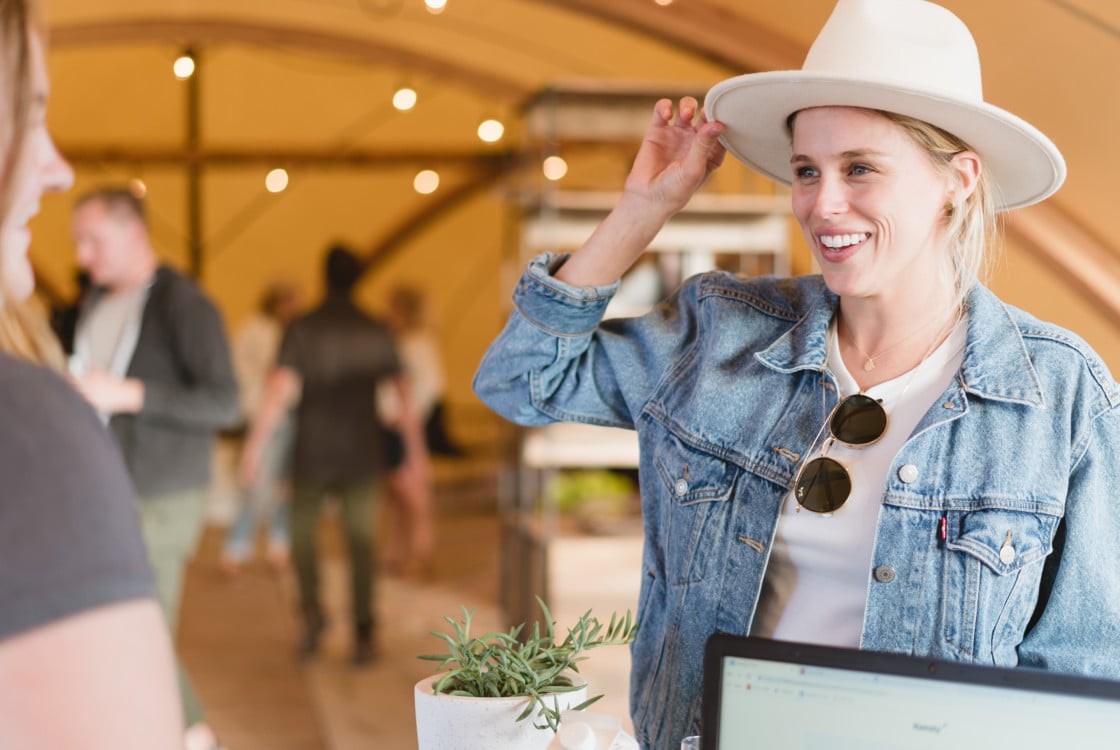 Woman Checking into Under Canvas