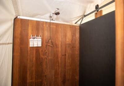 Shower in Under Canvas in-tent bathrooms