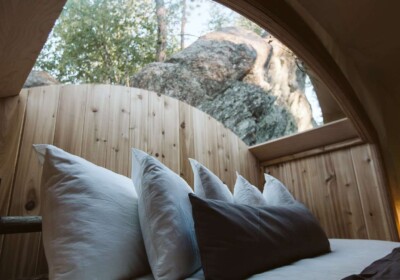 Close Up of Pillows on Bed in Under Canvas Stargazer Tent