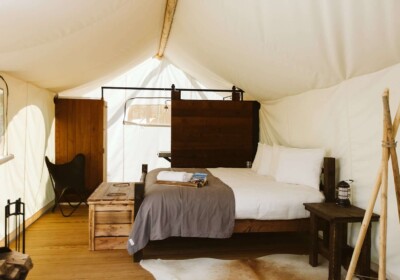 Interior of Under Canvas Luxury Glamping Tent with Bed and Bath