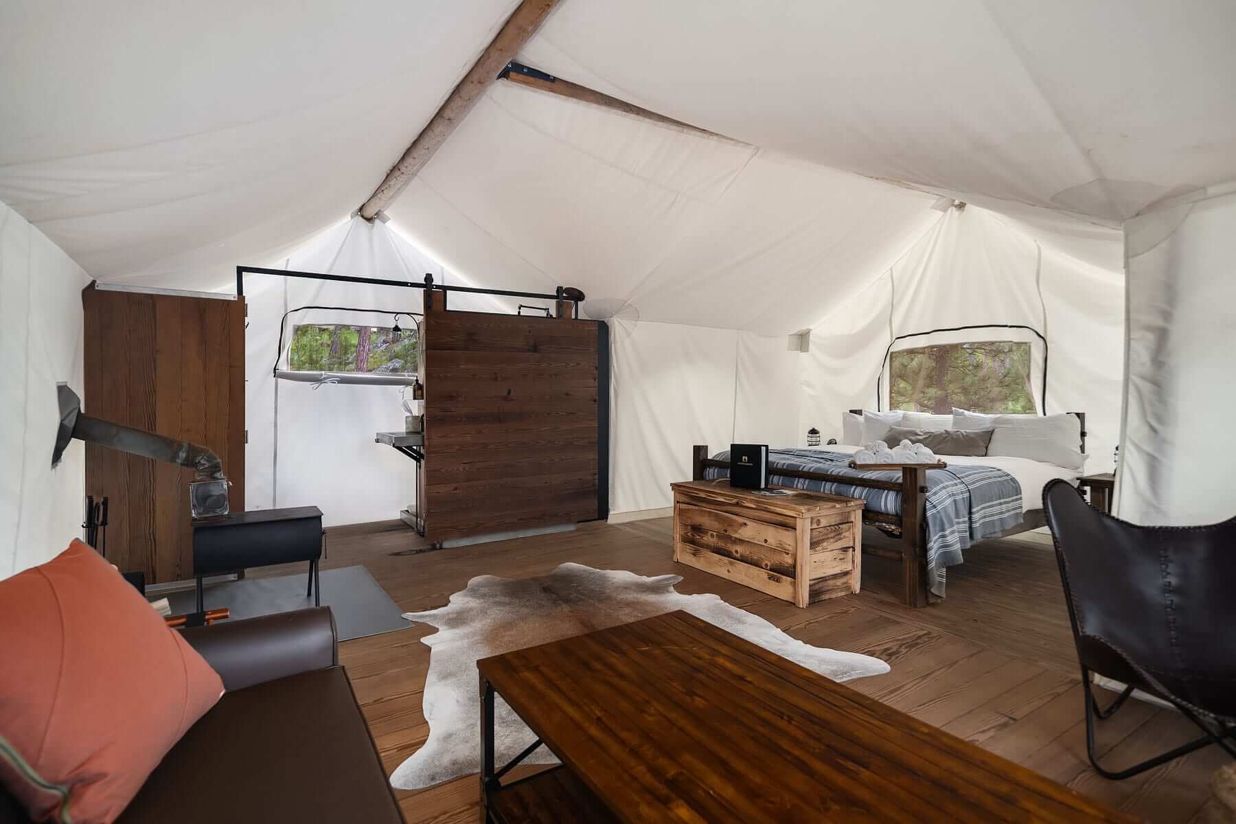 Under Canvas Mount Rushmore Suite Tent Interior with Sofa Bed and Ensuite Bathroom