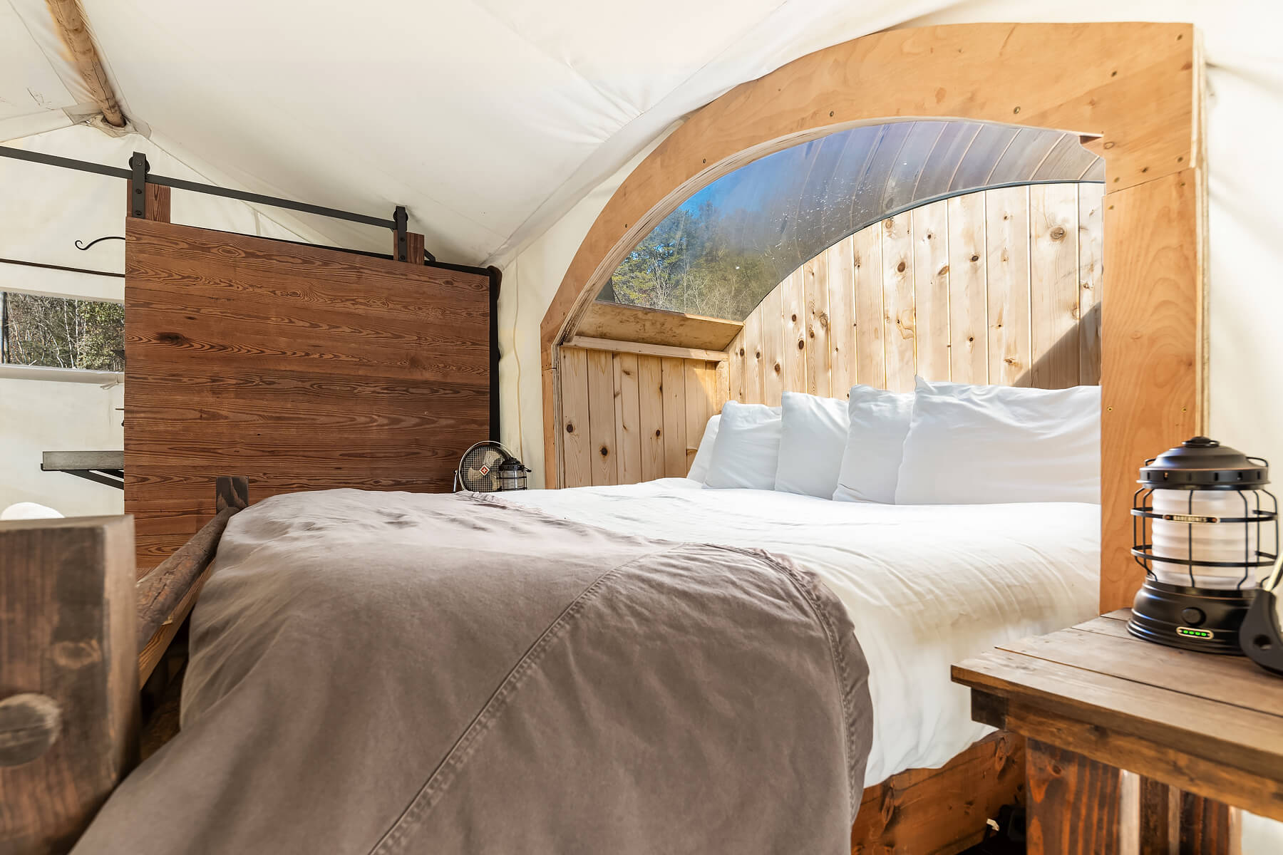 Stargazer King Bed and Viewing Window at Under Canvas Great Smoky Mountains