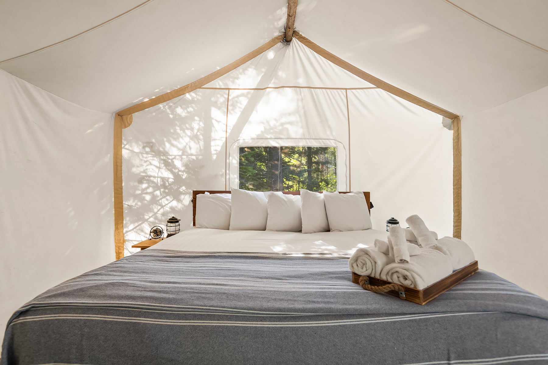 View of Bed in Suite Tent Under Canvas Glacier