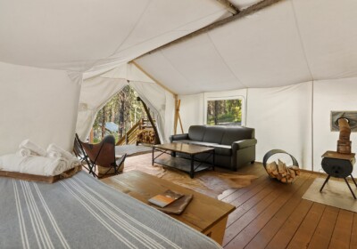 View of sitting area in Suite Tent at Under Canvas Glacier