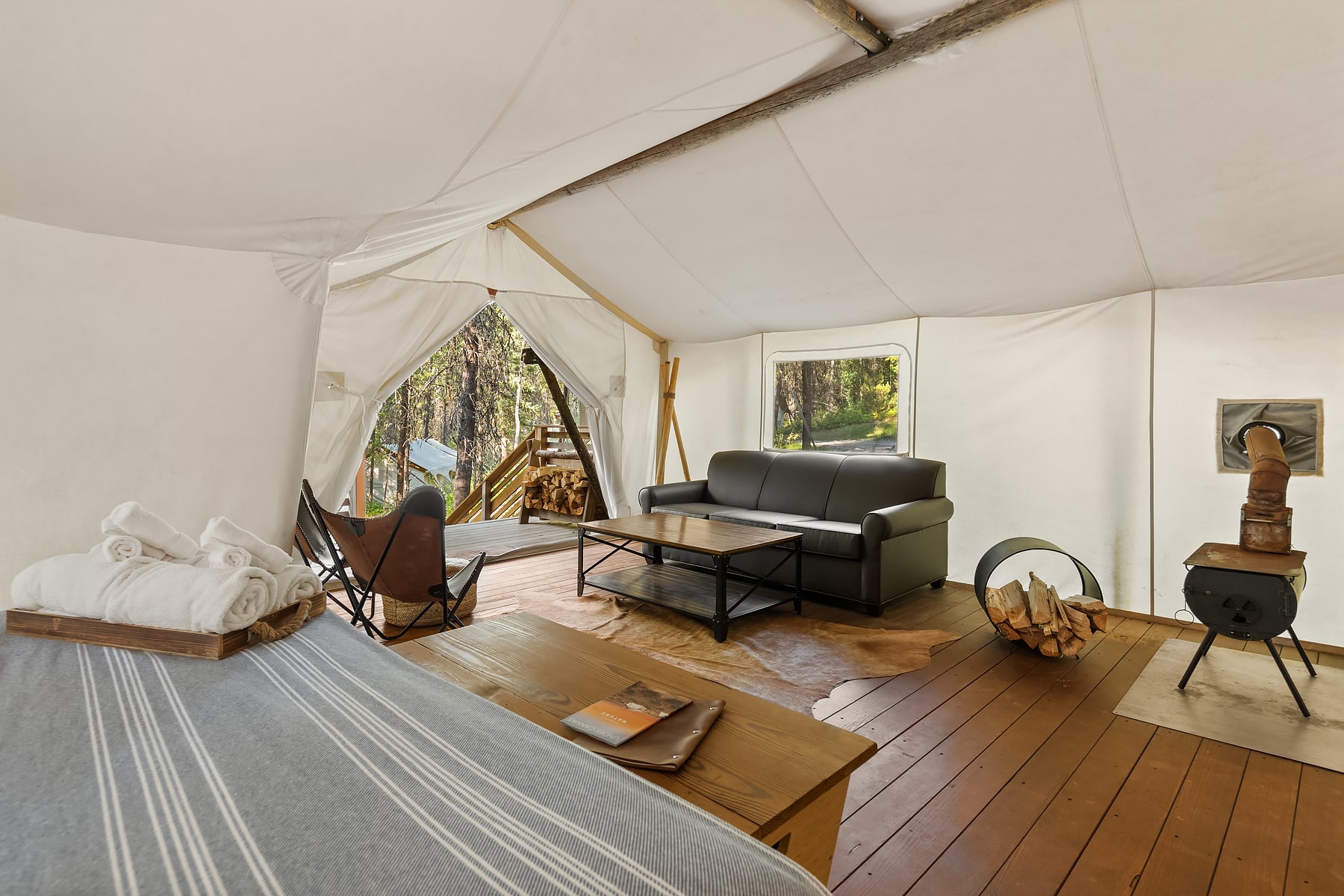 View of sitting area in Suite Tent at Under Canvas Glacier