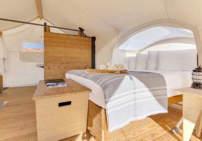 Stargazer King Bed with Viewing Window at Under Canvas