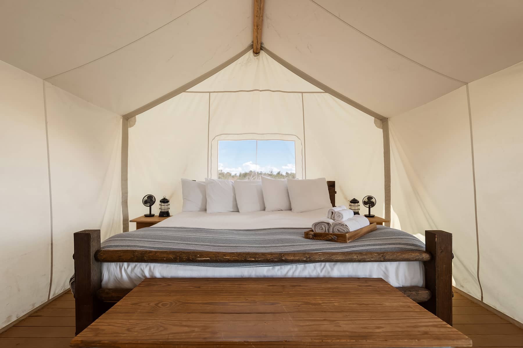 View of King Bed in Suite Tent at Under Canvas Grand Canyon