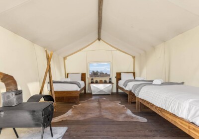 View of Safari Tent with Three Twins at Under Canvas Moab