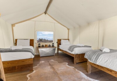 View of Safari Tent with Three Twins at Under Canvas Moab
