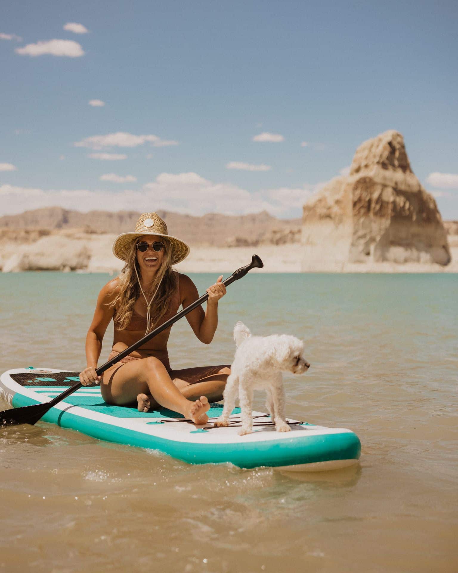 Dan and Chelle Stand Up Paddeling on Lake Powell