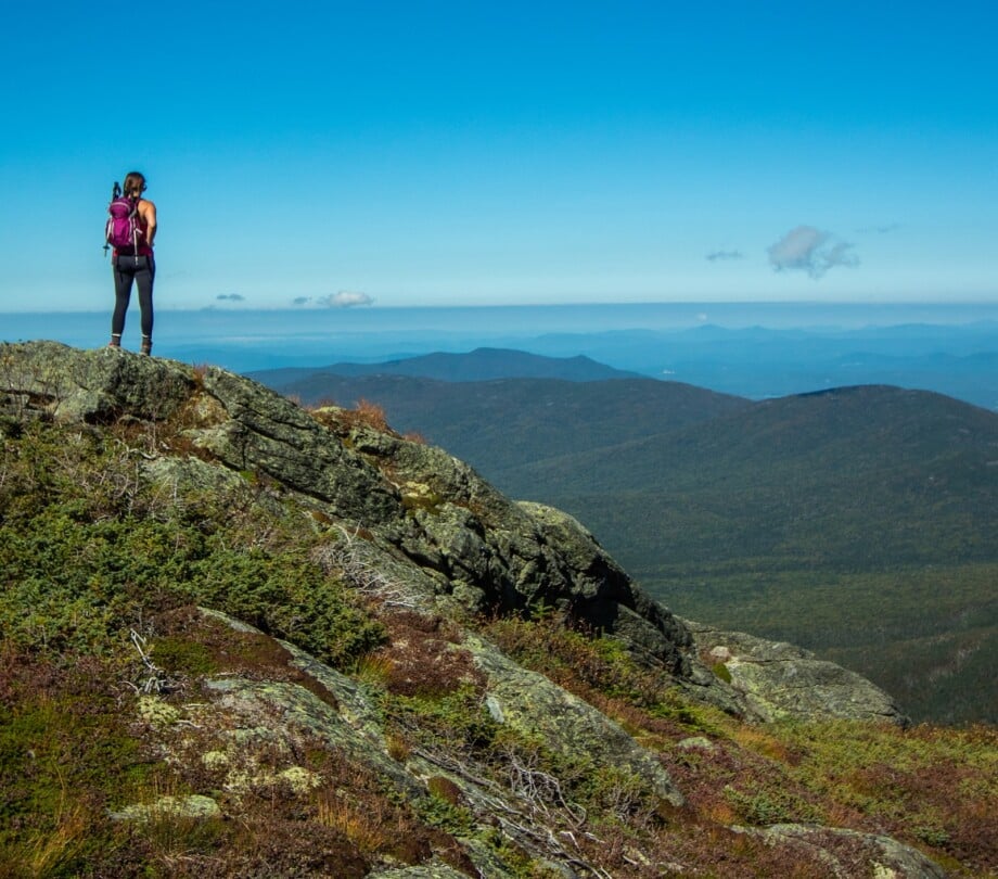 Woman hiking in the White Mountains of New Hampshire.