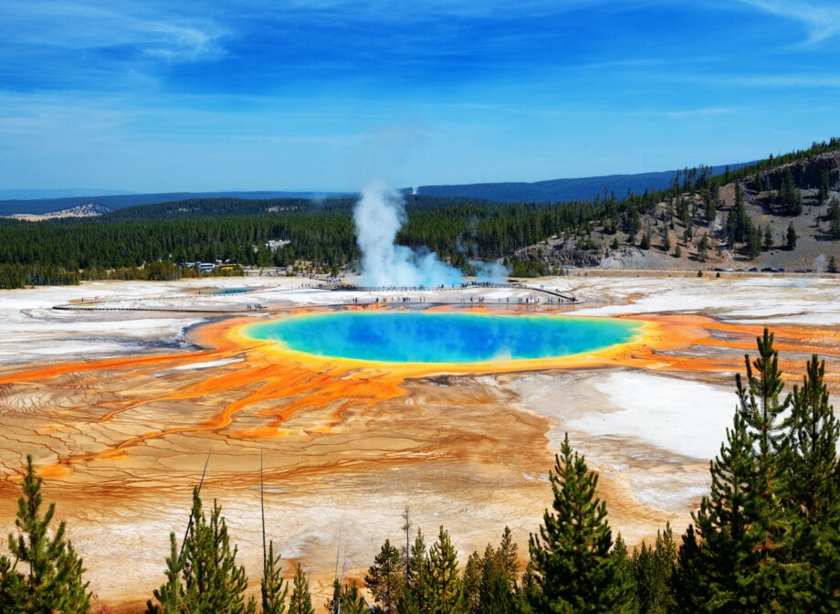 View of the Grand Prismatic Spring in West Yellowstone from a nearby viewing platform.