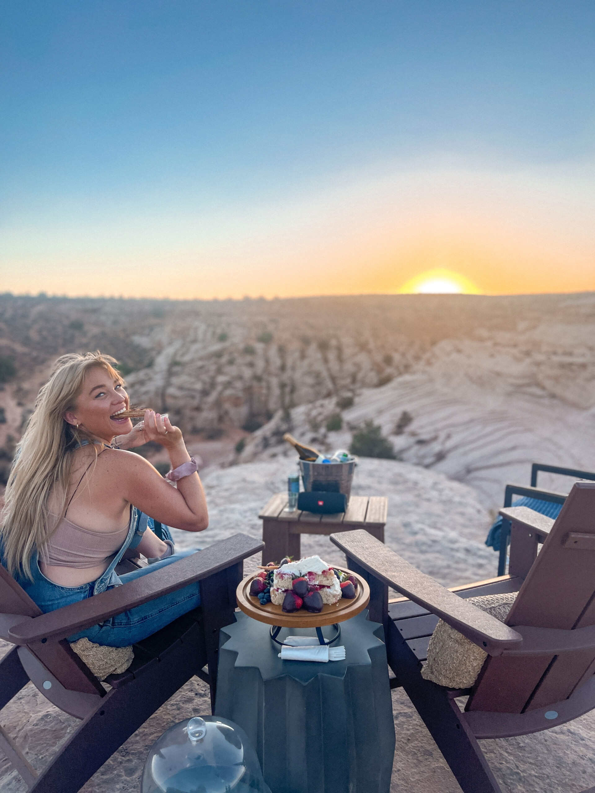 Alix Traeger Dining on canyon rim at Under Canvas Lake Powell - Grand Staircase