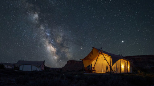 Milky Way over tents at Under Canvas Moab