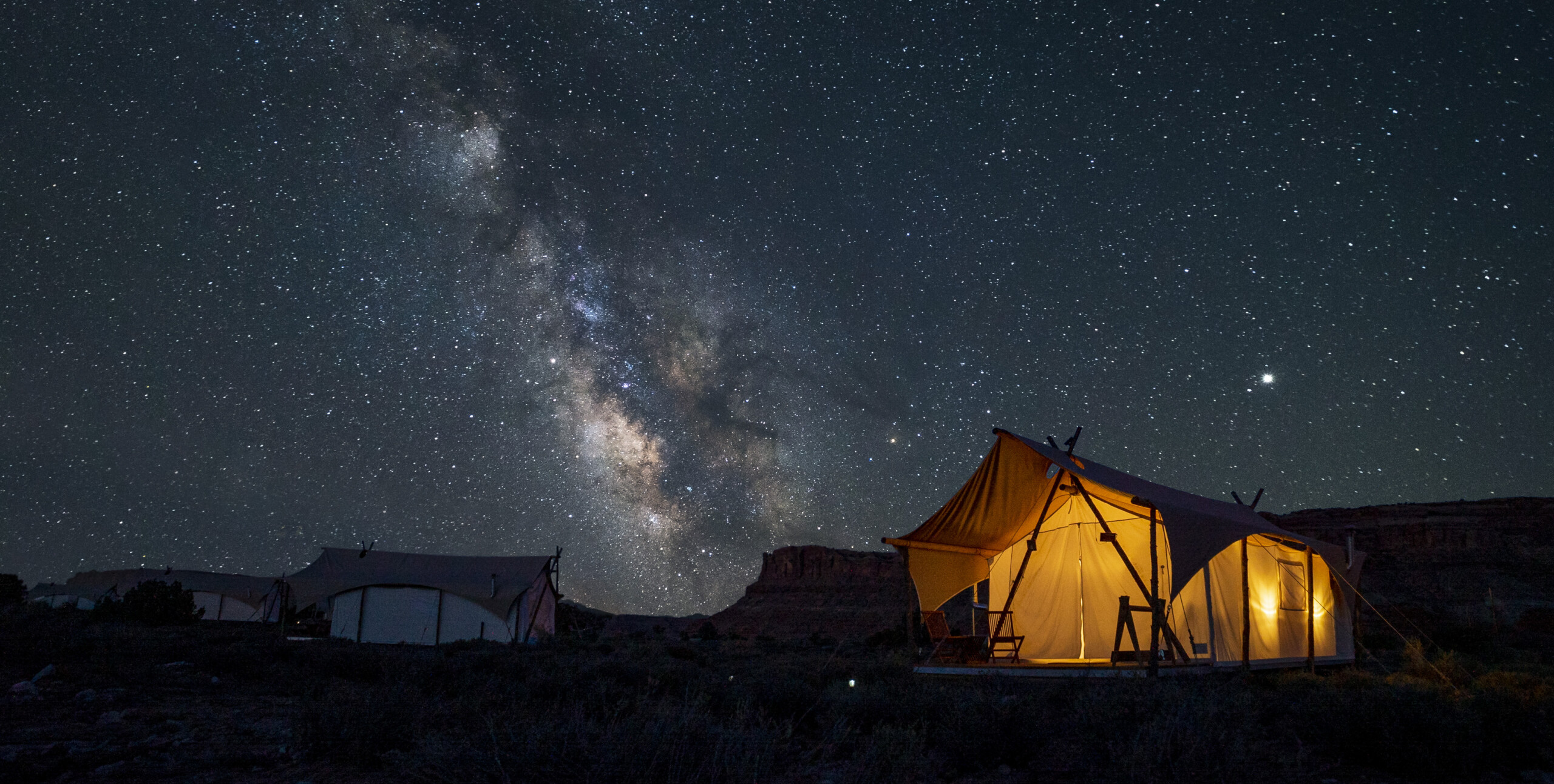 Milky Way over tents at Under Canvas Moab