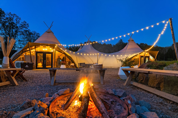 Under Canvas Great Smoky Mountains lobby tent at night