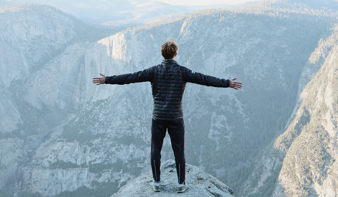 man on rock at Yosemite National Park