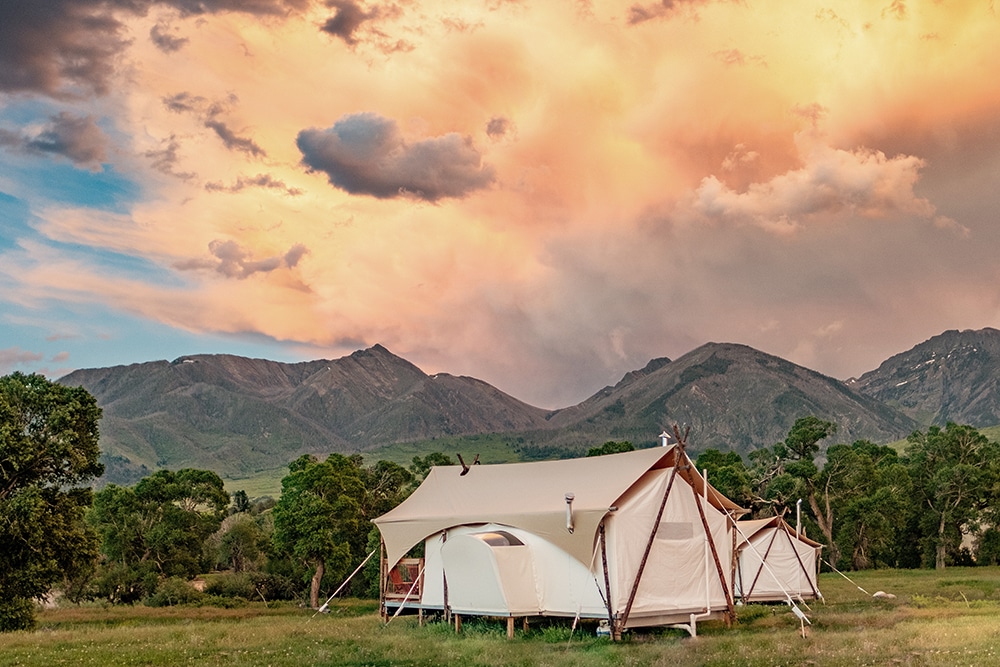 Tents under sunset at Under Canvas North Yellowstone - Paradise Valley