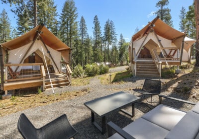two tent decks with outdoor patio seating
