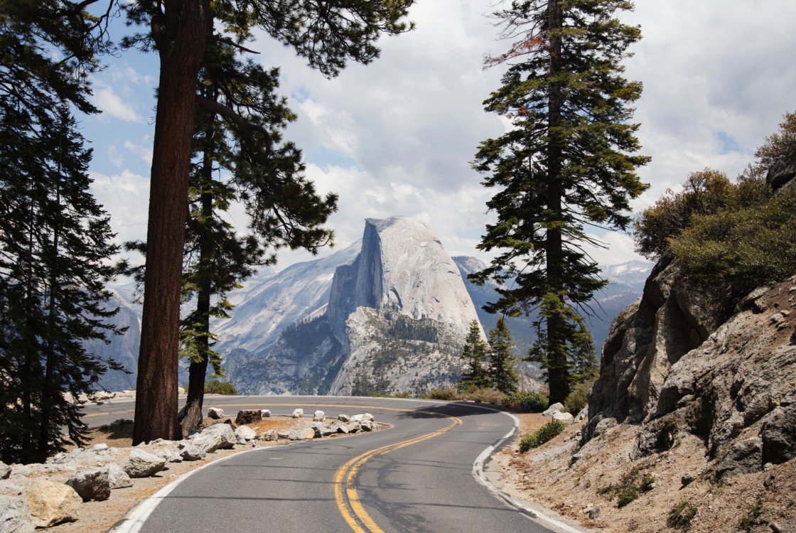 Half Dome in distance from road