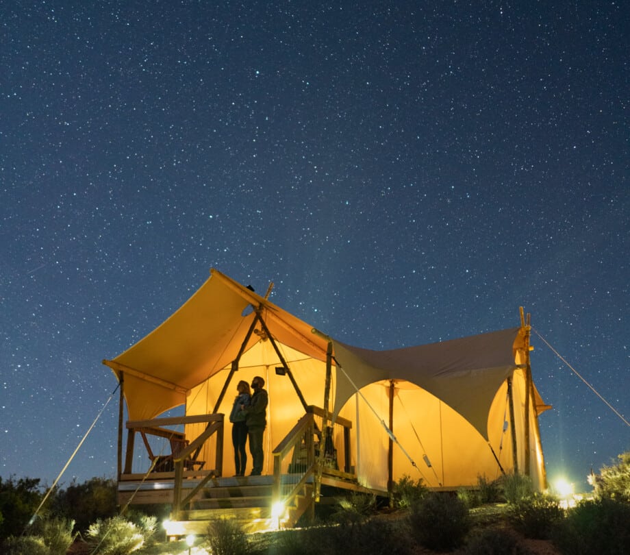 Couple enjoying the night sky at Under Canvas Lake Powell