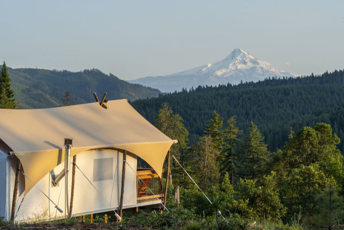Tent set on hill at Under Canvas Columbia River Gorge with view of Mount Hood