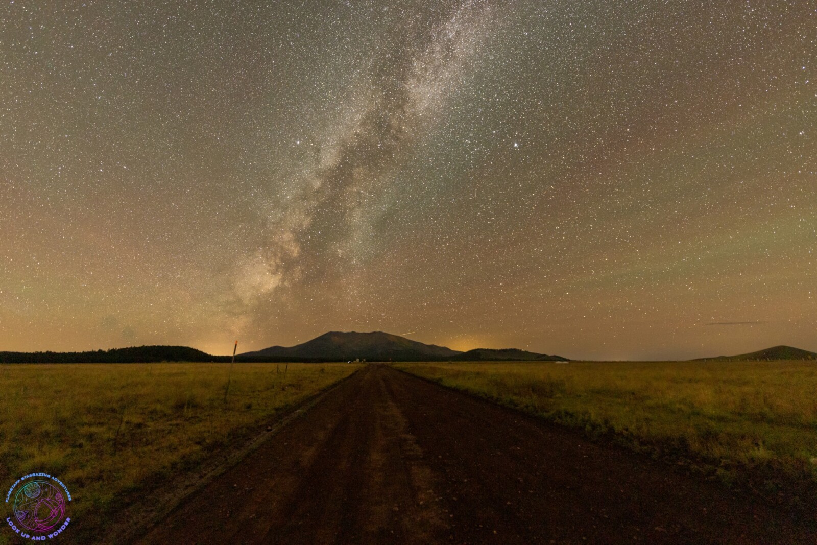 Milkyway over a desert landscape and lonely road near Flagstaff AZ.