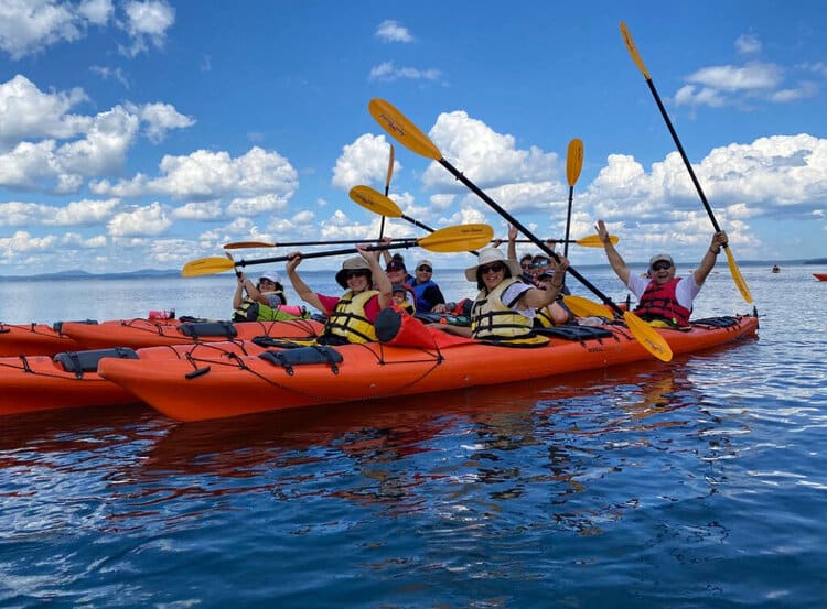 Group of kayakers in a bay in Maine