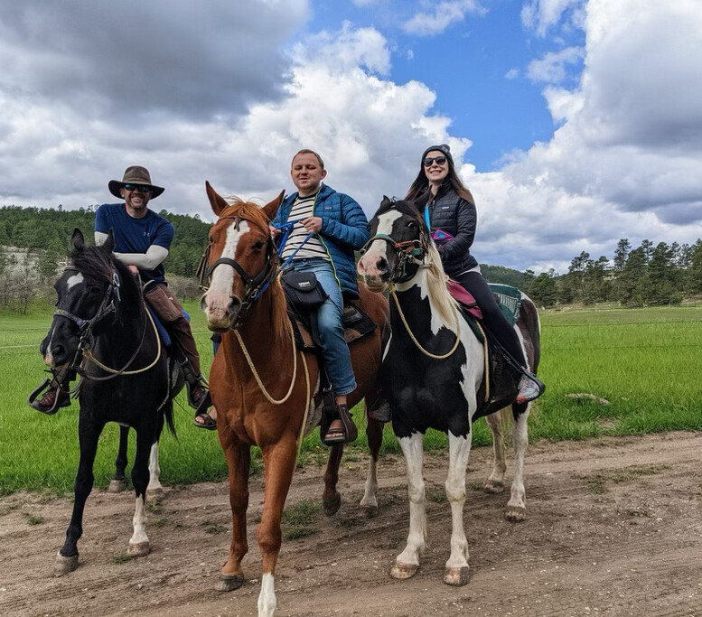 Group of horseback riders in the Black Hills.