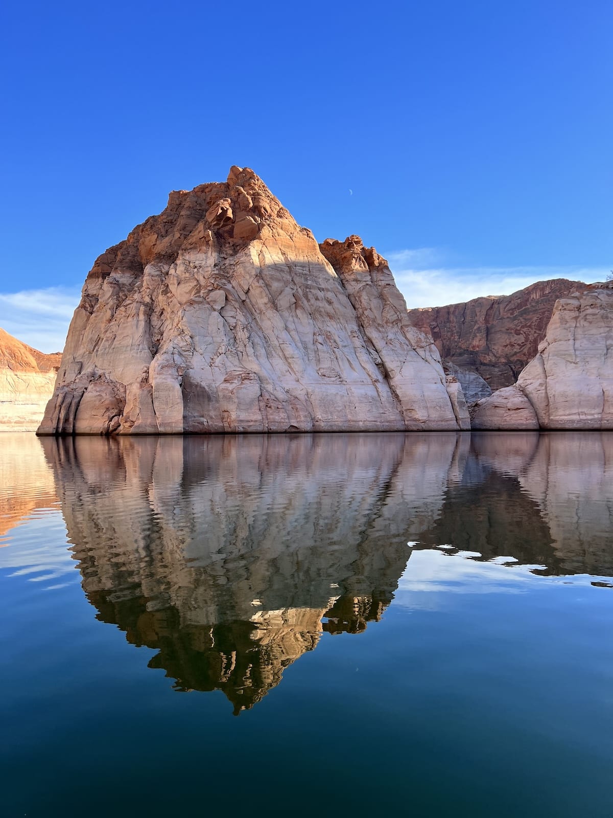View of cliff jutting out of lake powell.