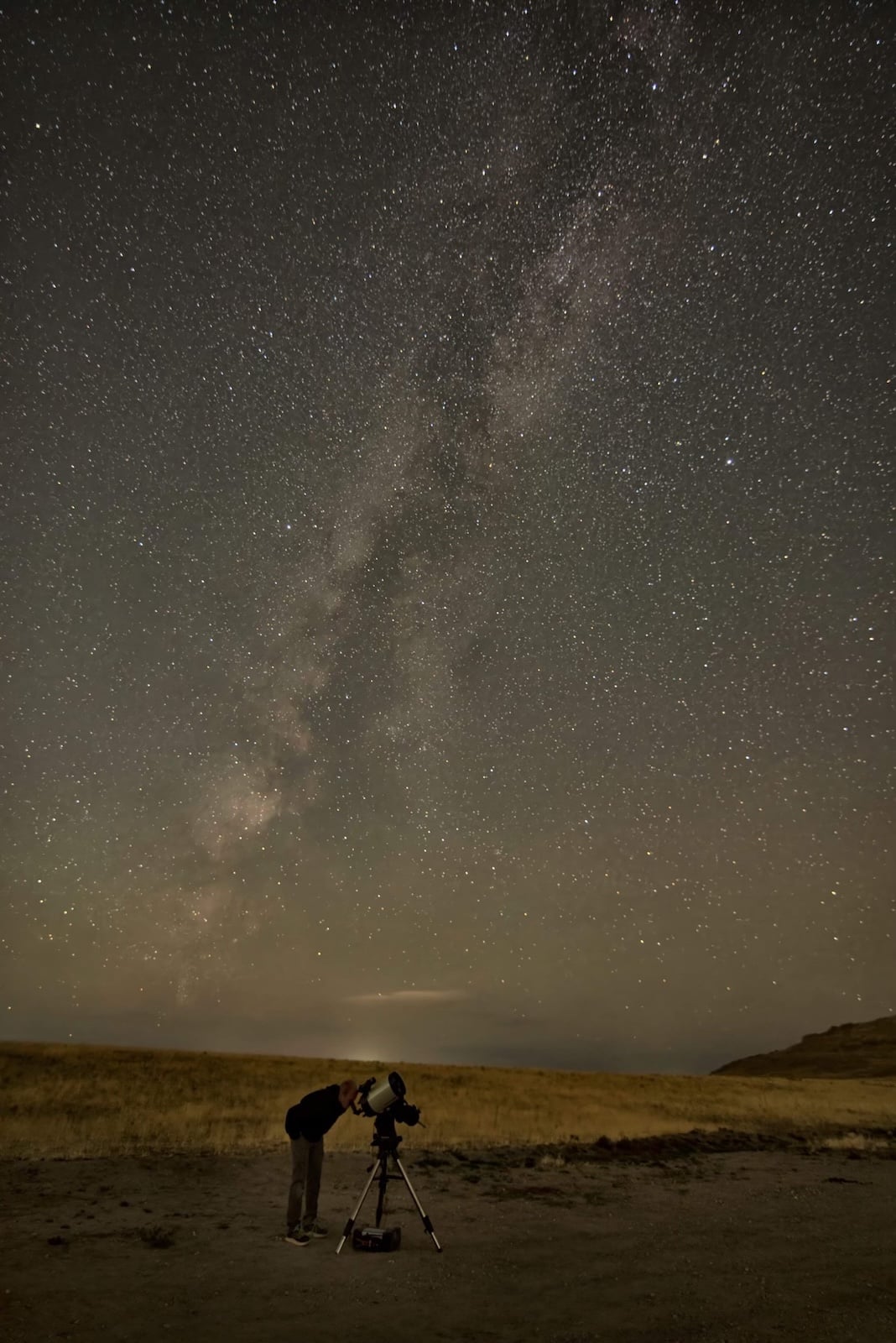 Person using a telescope looking at the Milky Way near Bryce Canyon National Park.