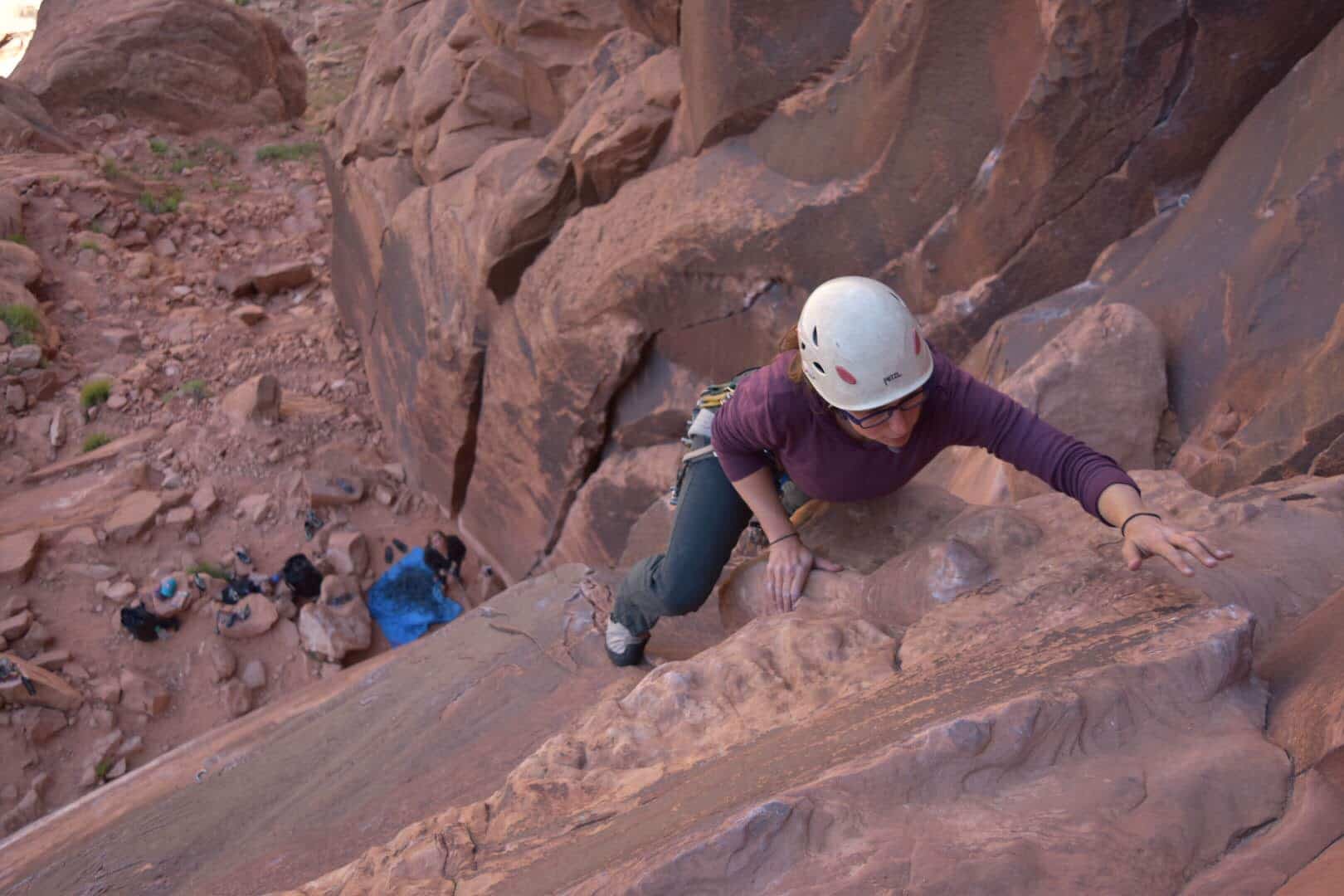 Person rock climbing in Moab.