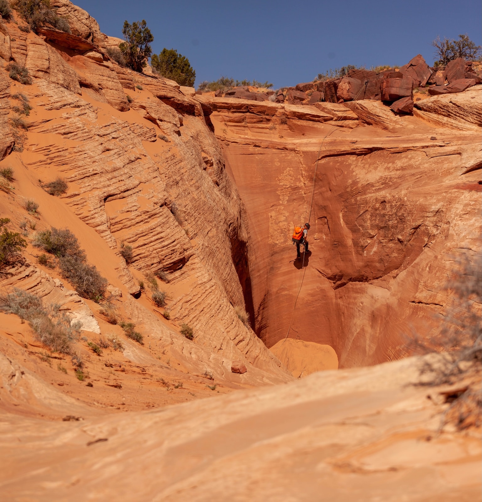 Man rapelling into Elephant Canyon.