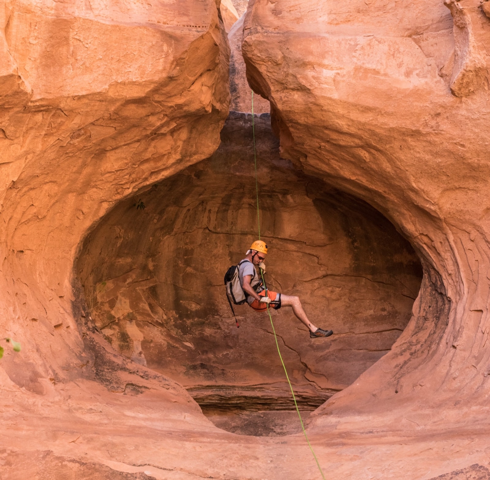 Man repelling down Granary canyon.