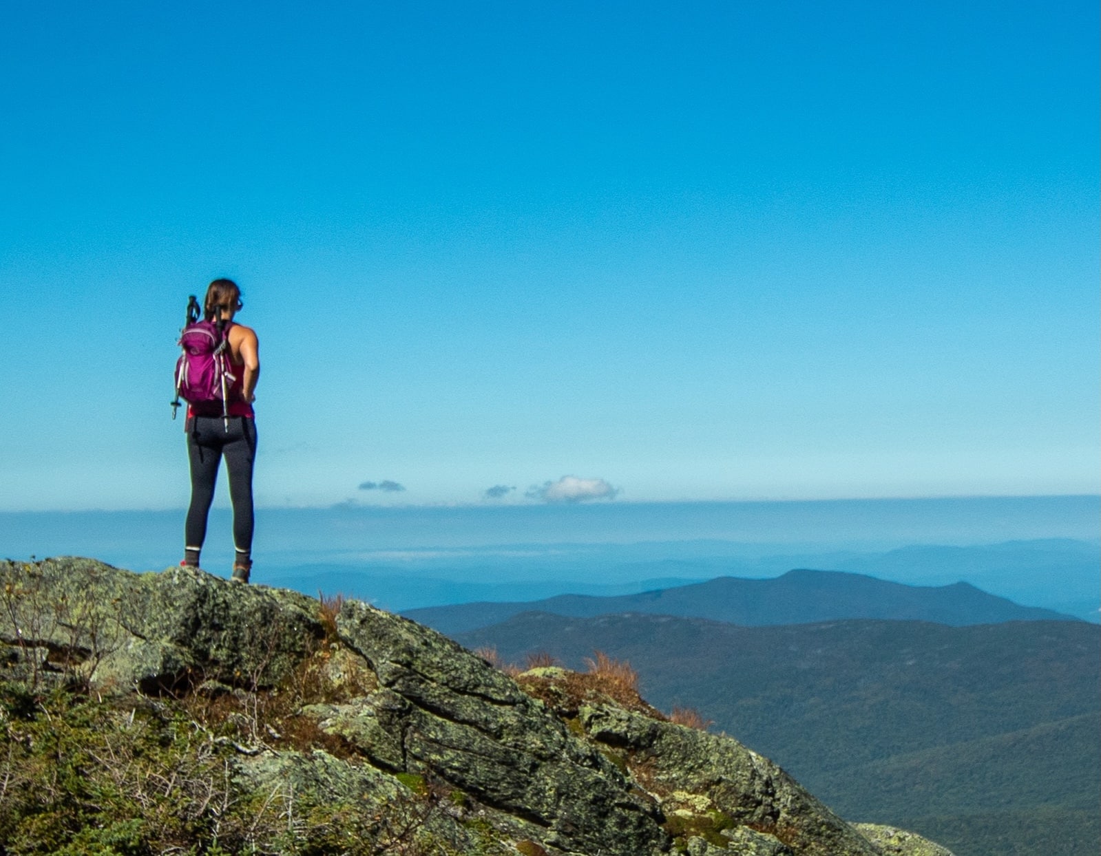 Woman hiking in the White Mountains.